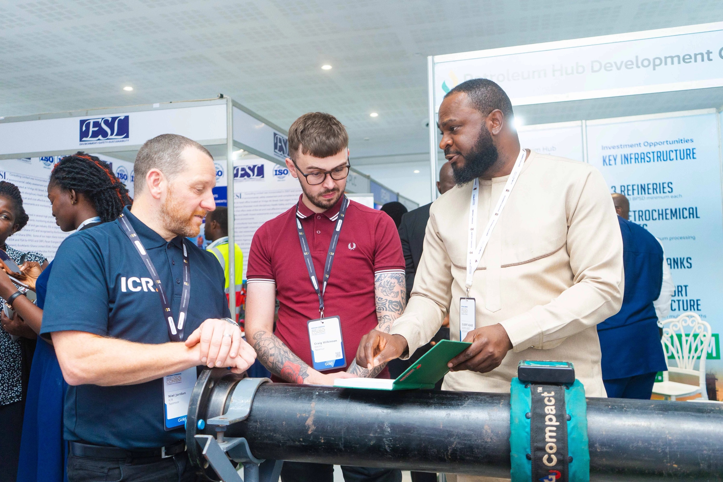 ICR and Gecric representatives discussing a pipe demonstration at LCCE 2025