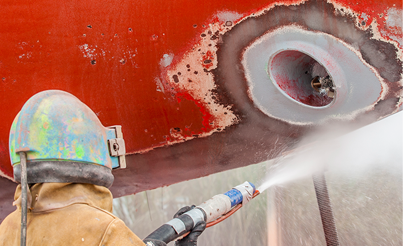 Technicians carrying out fabric maintenance on a structure