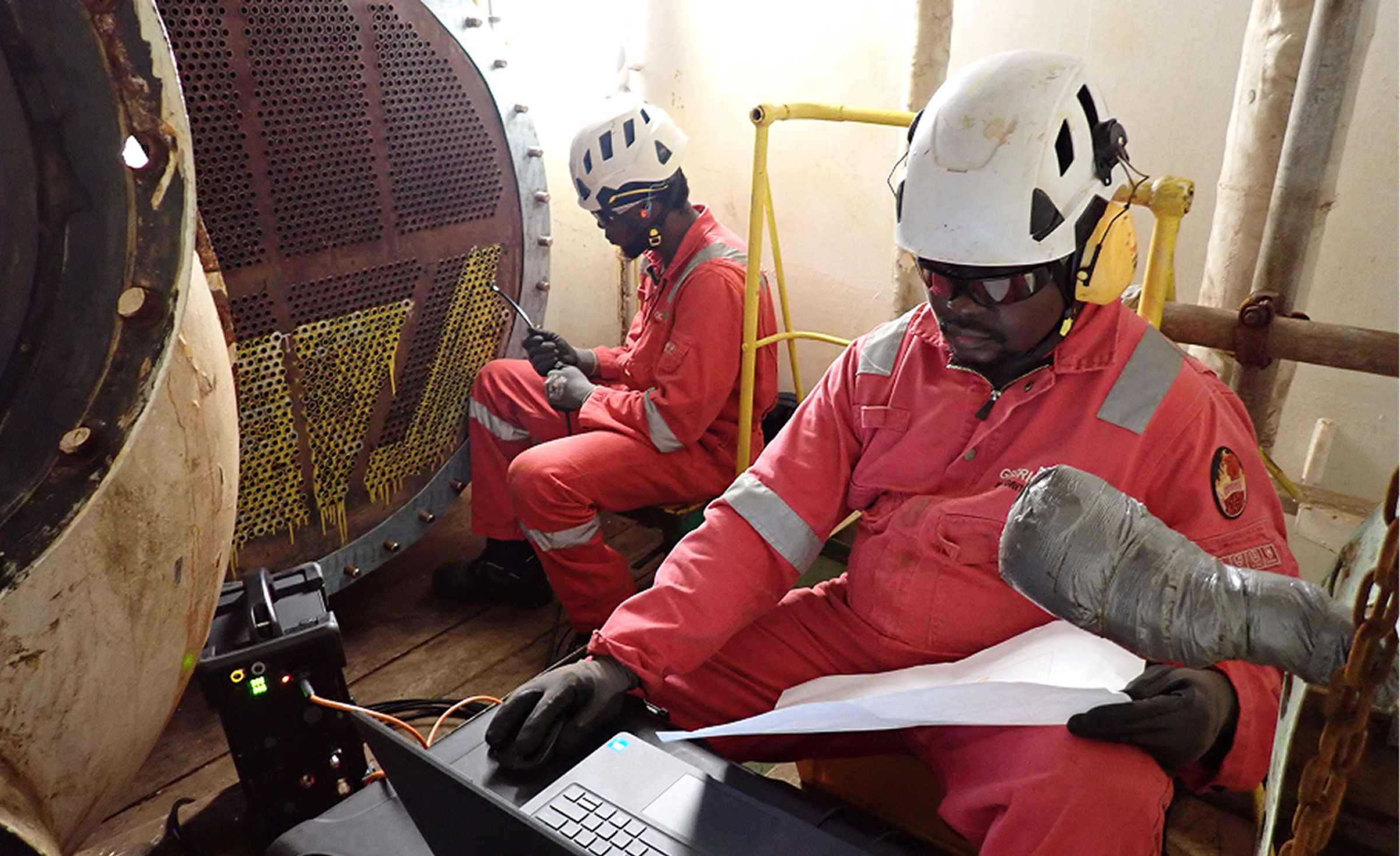 Technicians carrying out internal rotary inspection system testing