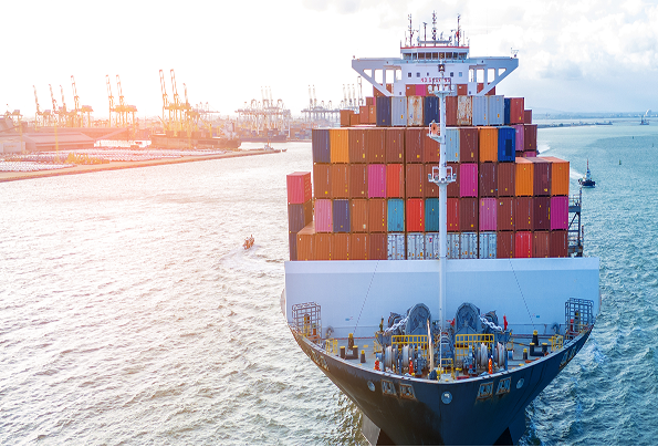 Cargo vessel at a busy port