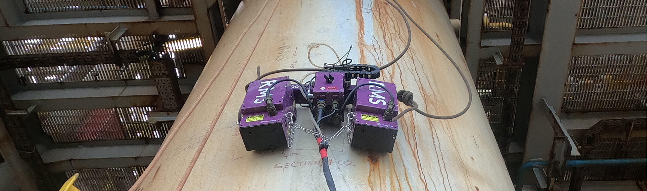 Technician applying non-destructive testing techniques