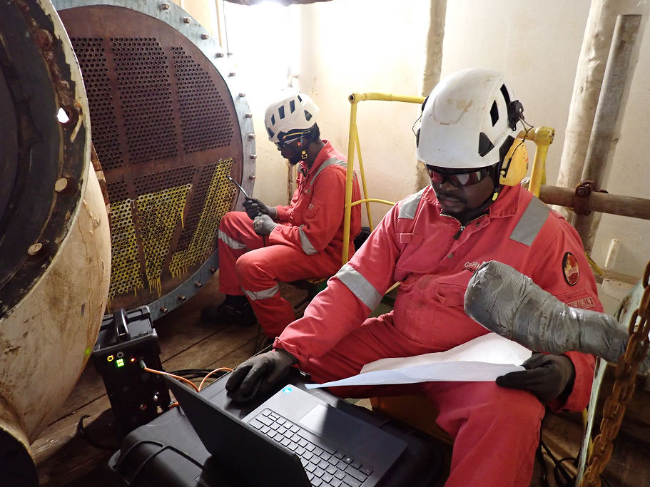 Technicians carrying out internal rotary inspection system testing
