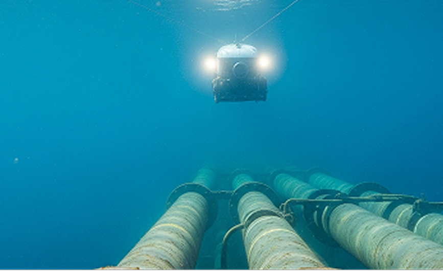 ROV inspecting subsea pipelines offshore
