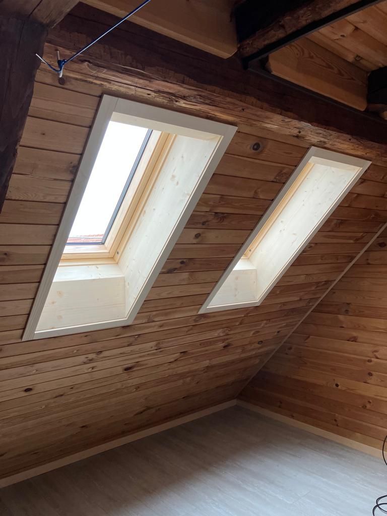 Lukarneneinbau mit Fassadengestaltung im Bestand