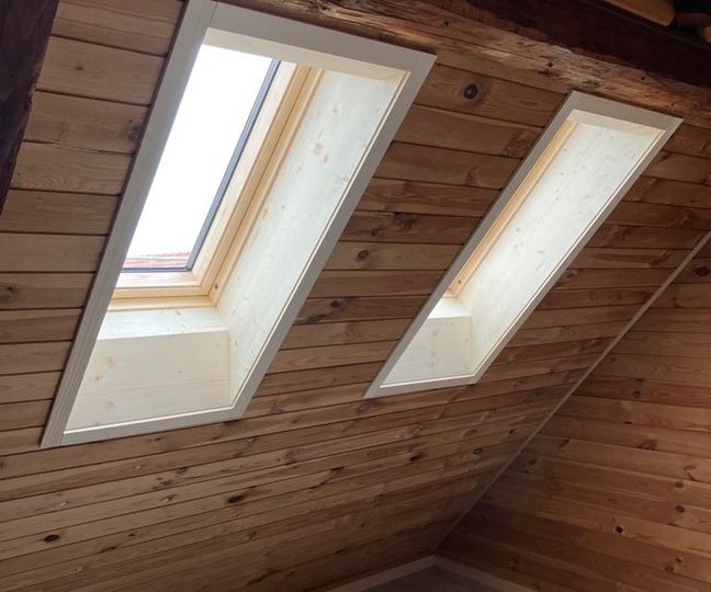 Lukarneneinbau mit Fassadengestaltung im Bestand