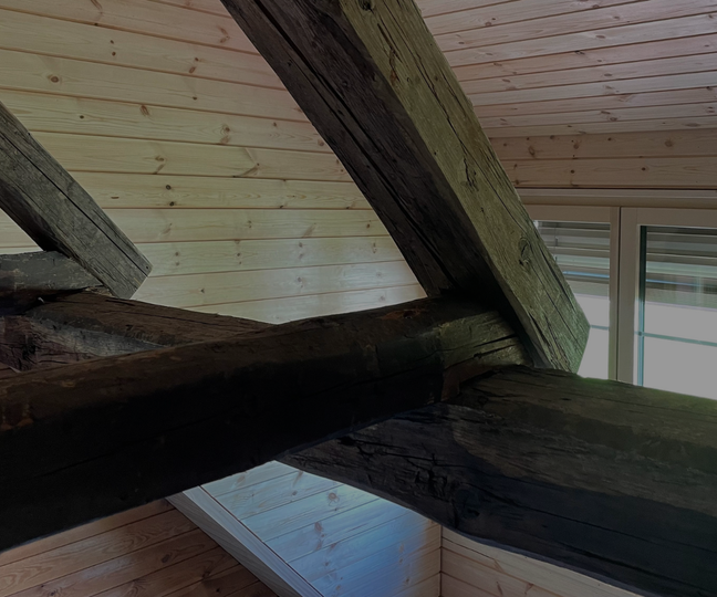 Lukarneneinbau mit Fassadengestaltung im Bestand