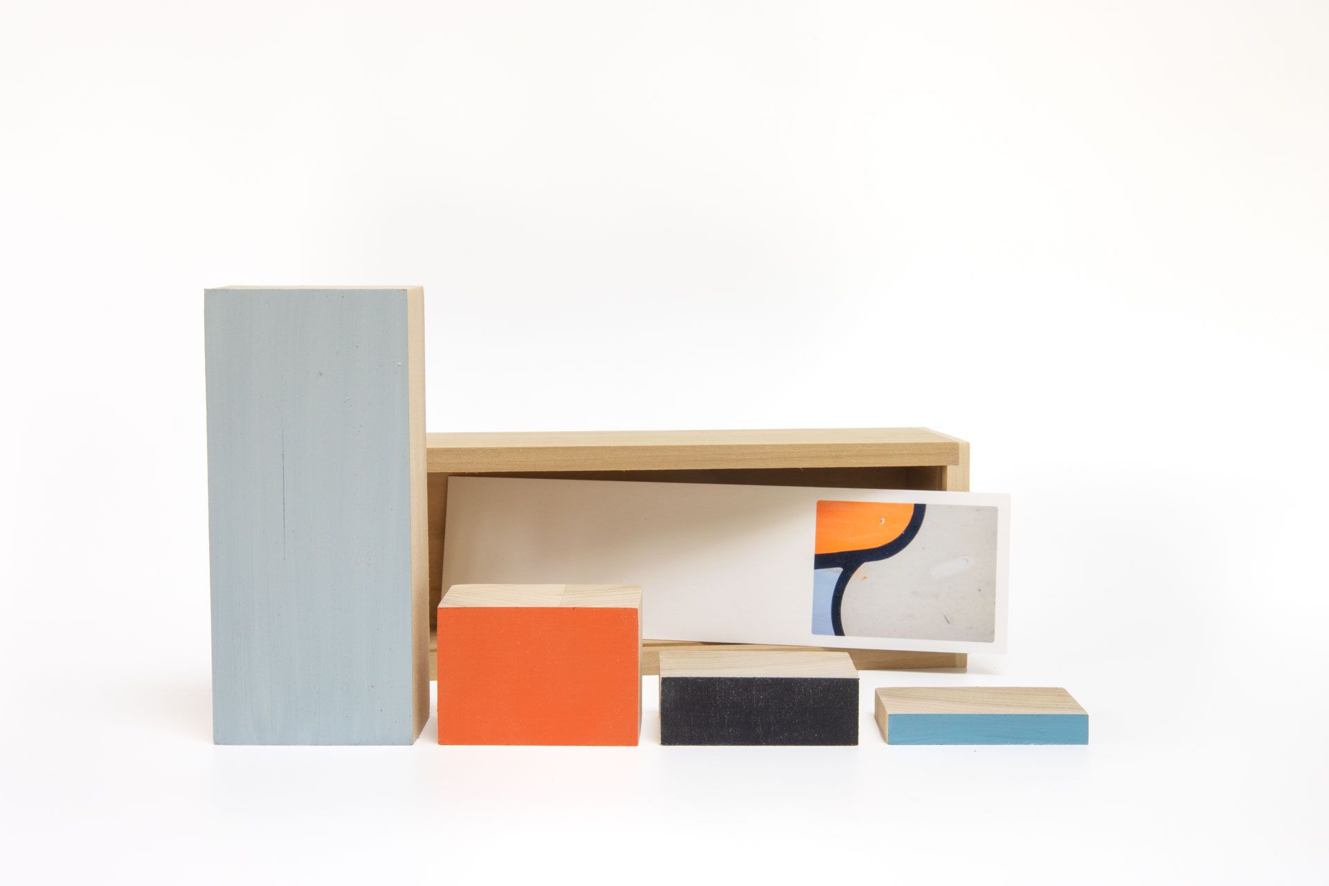 Doosje met foto en de bijhorende houten blokken