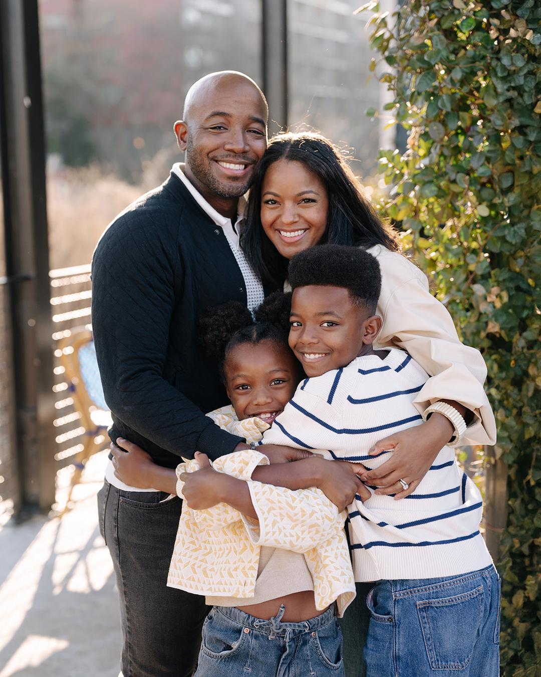 Erica Tuggle with her kids at the kitchen