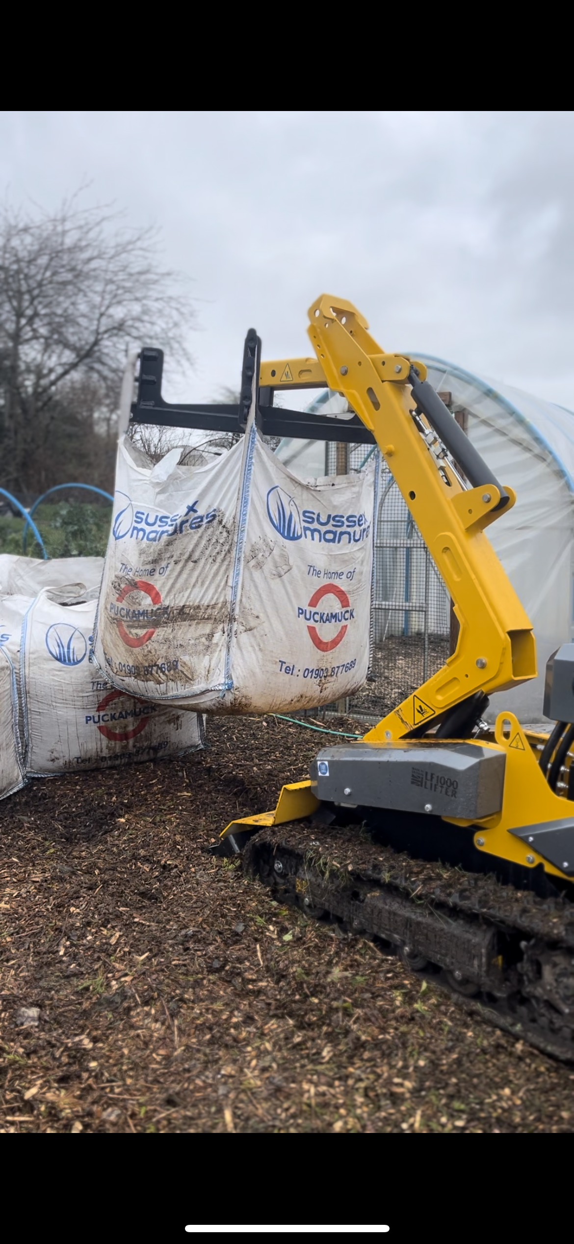 Our loader, unloading a Puckamuck bulk bag.