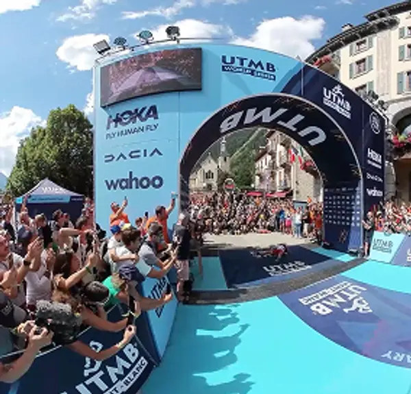 Starting line of the UTMB race with runners preparing to begin