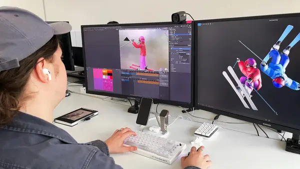 Behind-the-scenes shot of a 3D artist developing Skimasters in-game assets