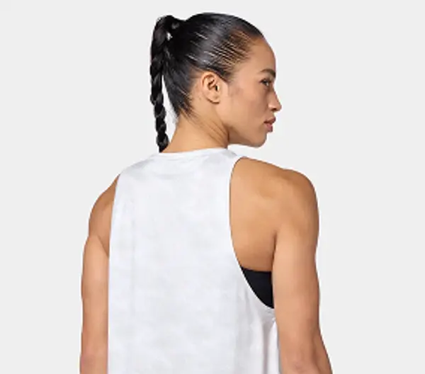 Sportswoman wearing an athletic tank top, photographed from behind