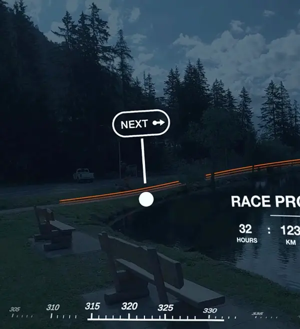 VR headset view of a lakeside route at night with wayfinding graphics on screen
