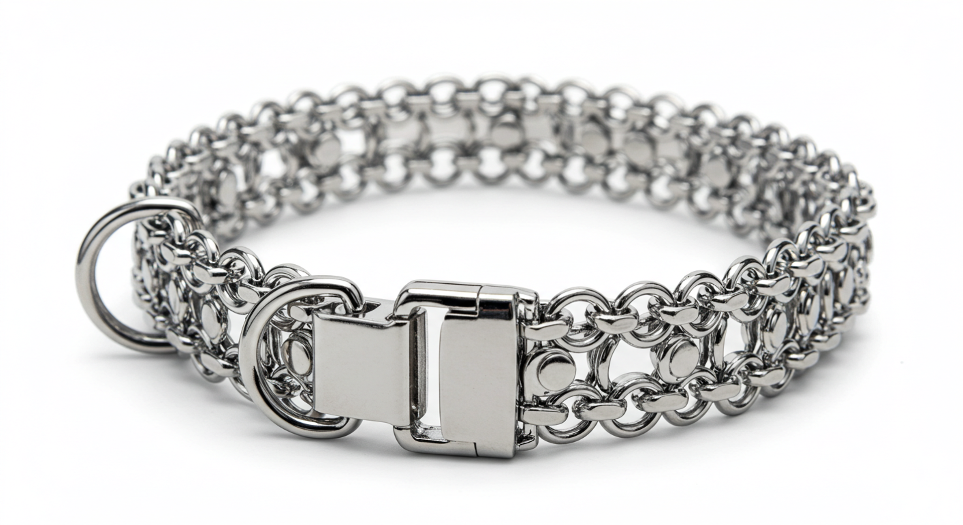 Close-up of a stainless steel prong collar on a white background.