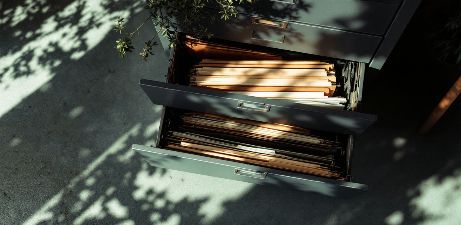Unlabeled account folders in an office storage corner