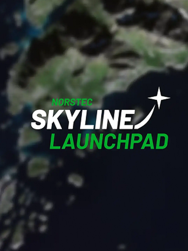 Satellite view of a coastal region with green mountains, rocky islands, and deep blue ocean.