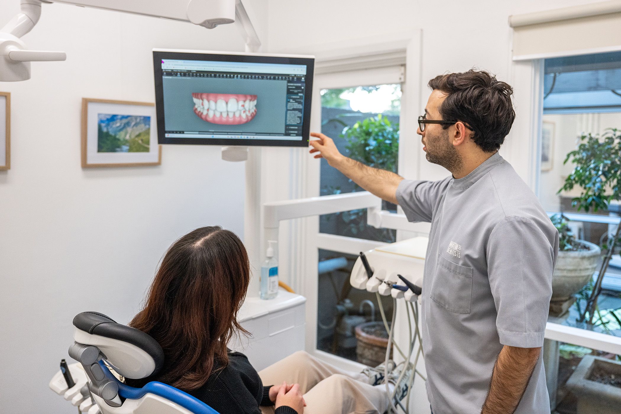 Our dentists and staff outside of a x-ray room.