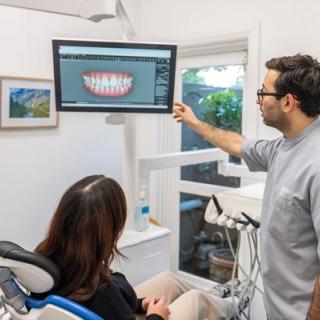 Our dentists and staff outside of a x-ray room.