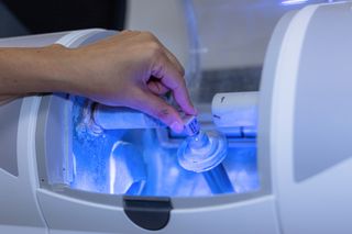 Image of a CEREC machines creating a dental implant.