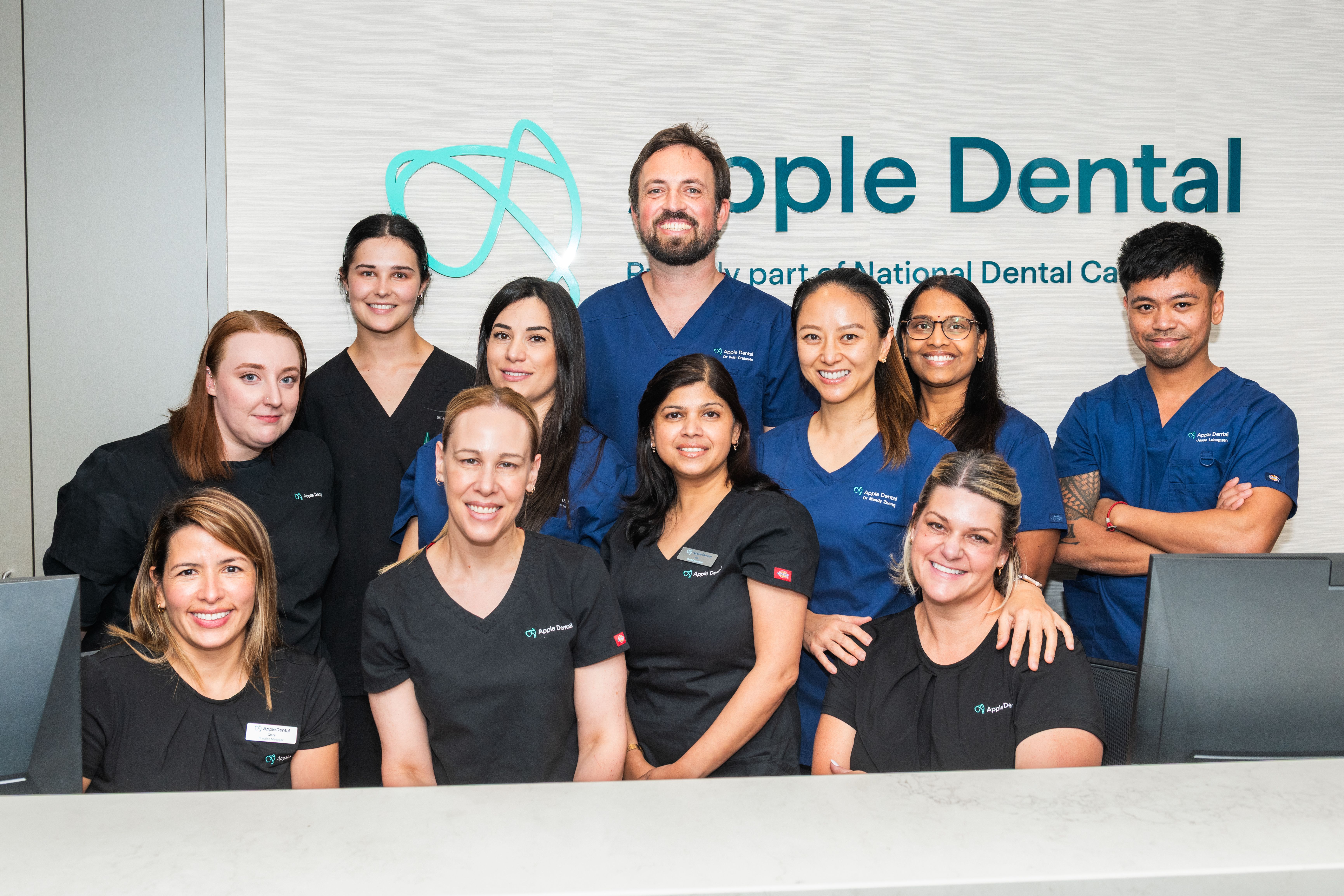 Apple Dental's dentists with our staff.