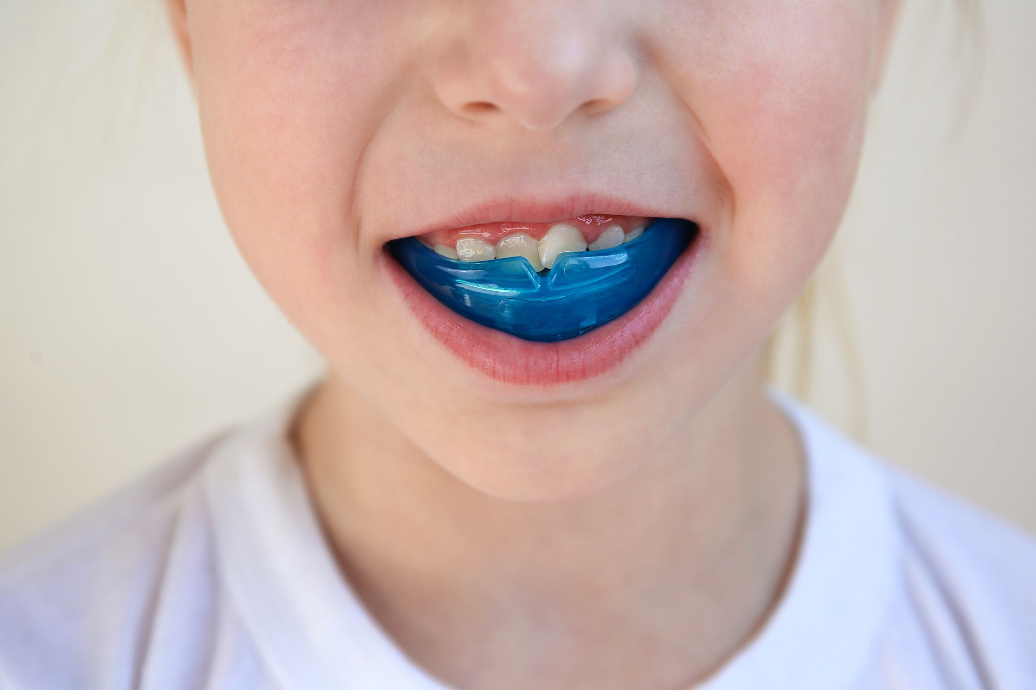 Image of a man looking at his teeth with happiness.