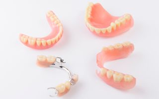 An image of an assortment of conventional dentures