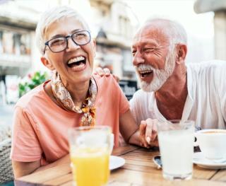 Female enjoying with white teeth at home