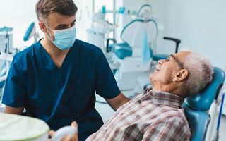 Patient receiving a routine dental scale and clean