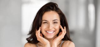Stock image of a woman smiling.