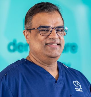 Dr Cherian Thomas - Dentist