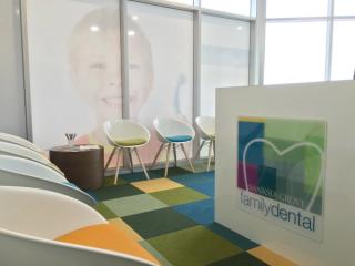 Image of DB Dental Banksia Grove's waiting room that is colourful and modern.
