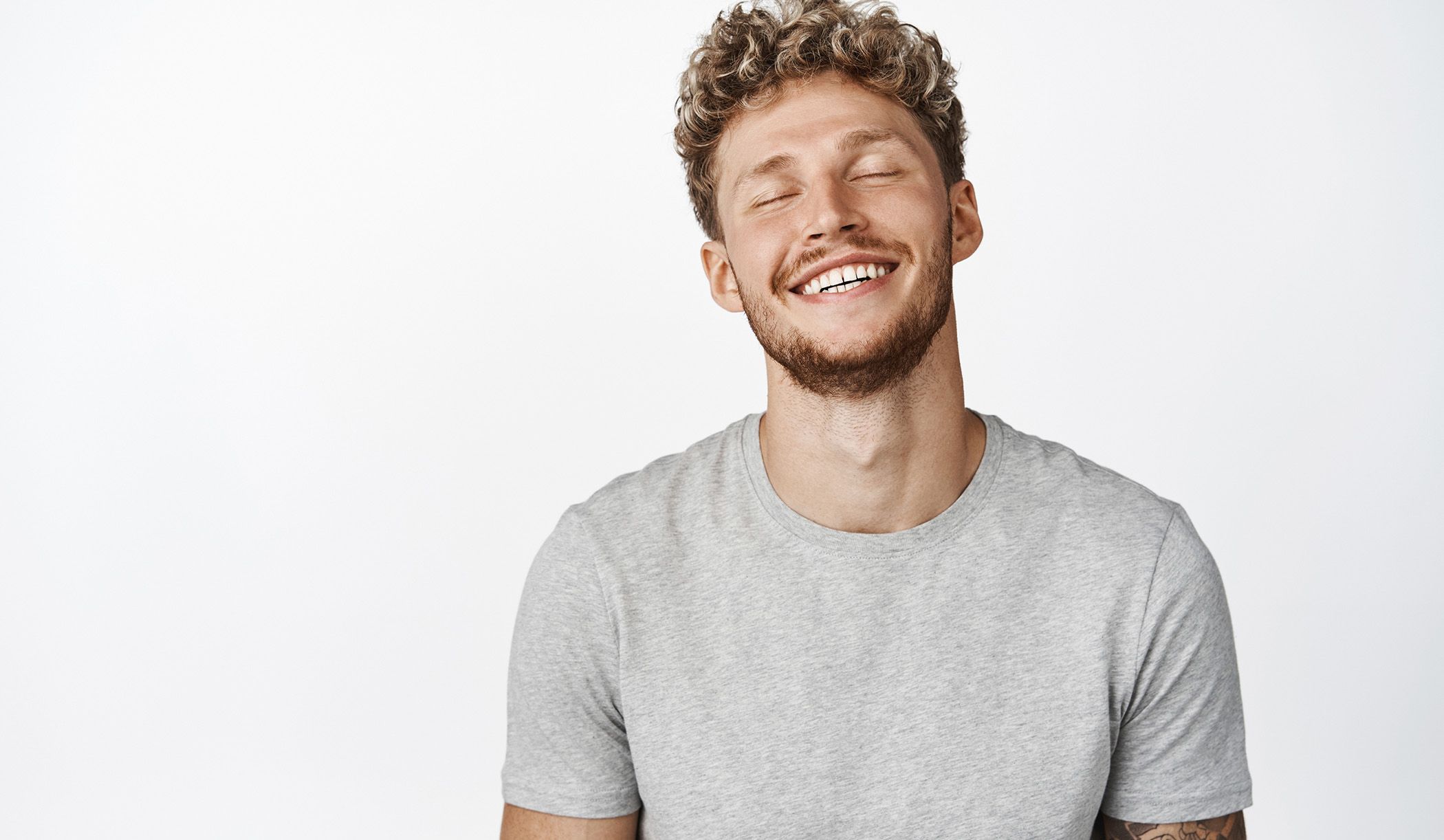 Image of a young man being happy with nice white teeth.