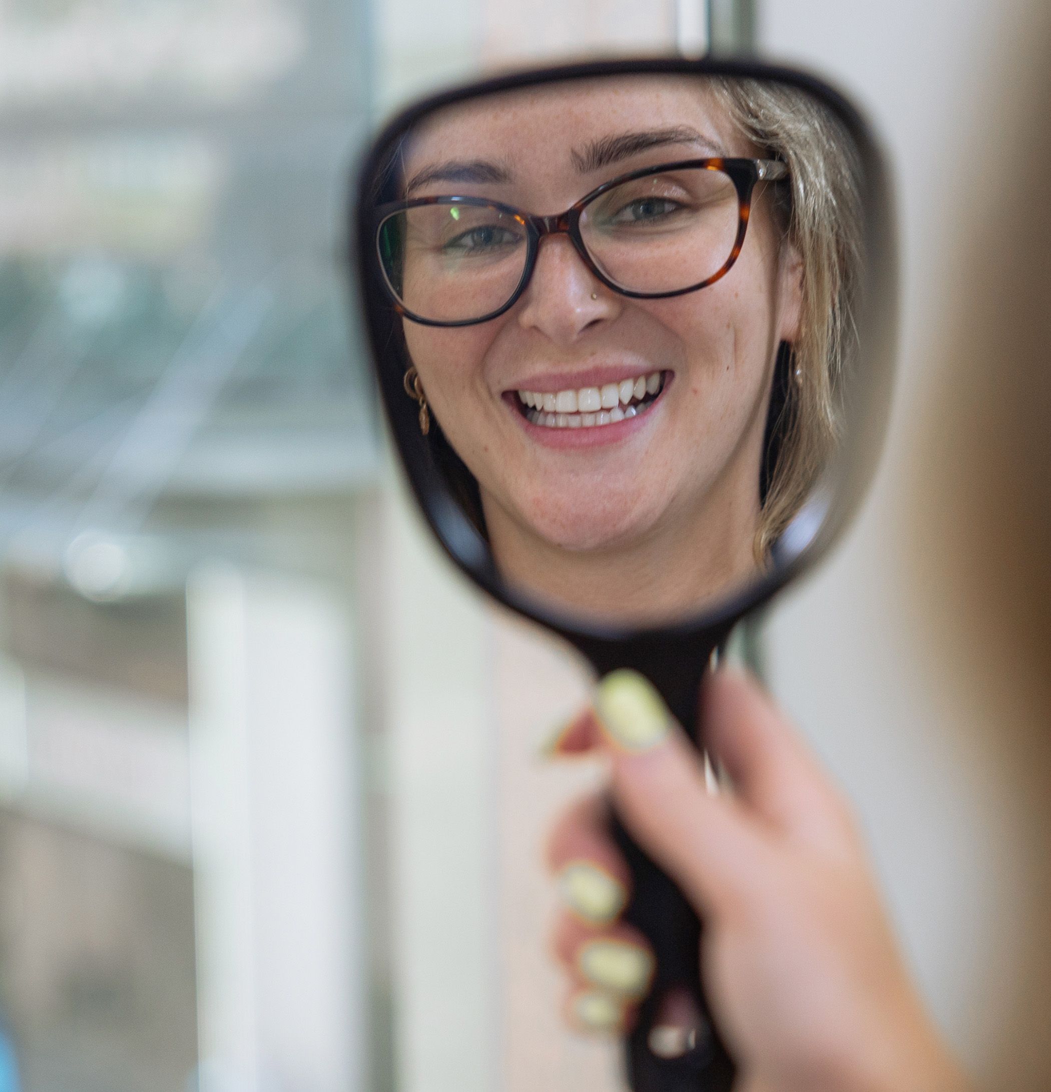 Image of a patient in CBD Sydney enjoying her beautiful smile.