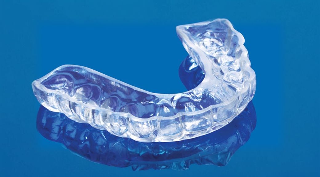Transparent plastic custom-fitted mouthguard