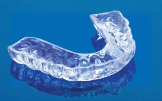 Transparent plastic custom-fitted mouthguard