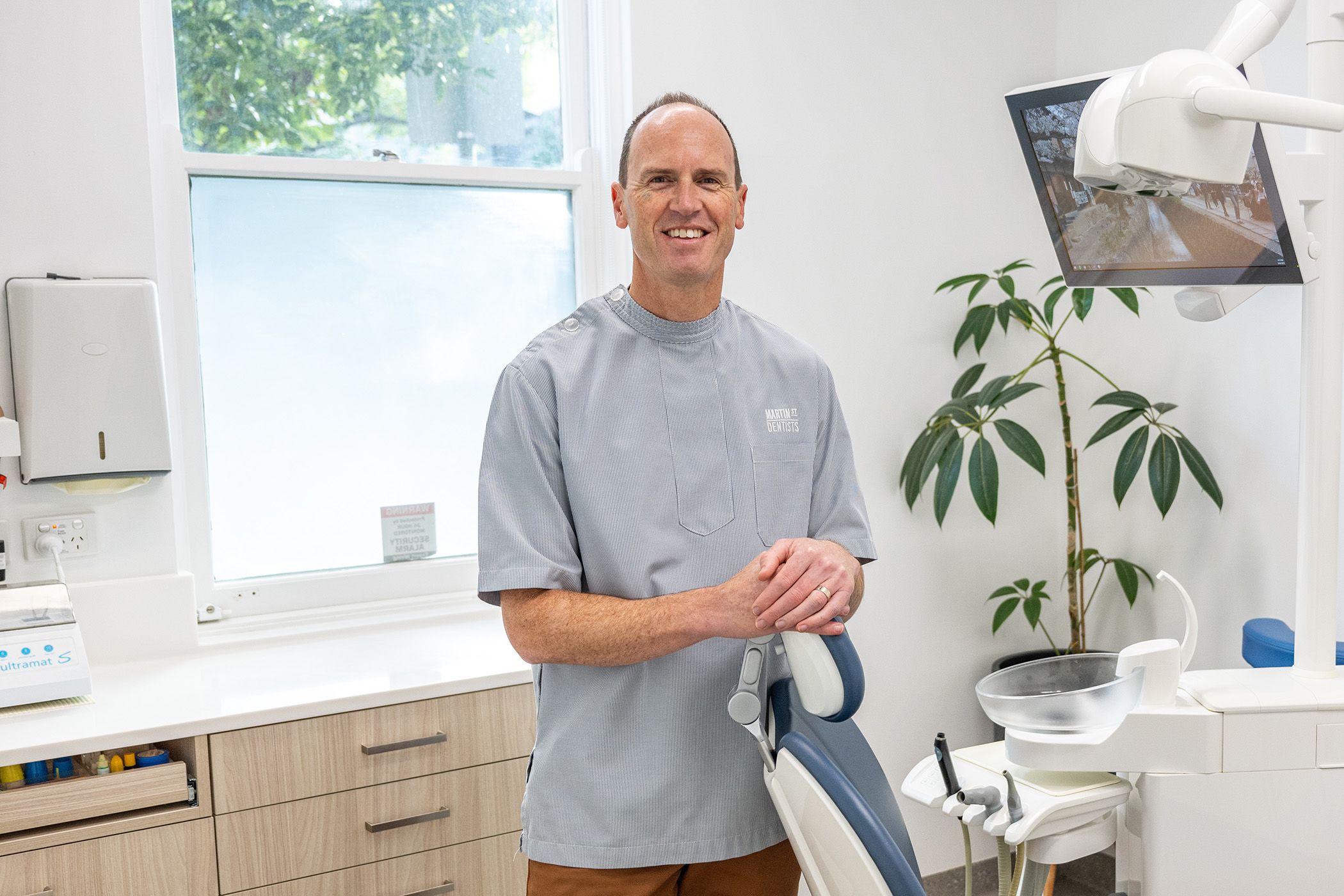 Stock image of young female suffering from a headache