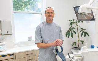 Stock image of young female suffering from a headache