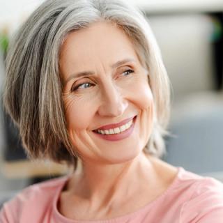 Image of an elderly lady with white teeth and a great smile.