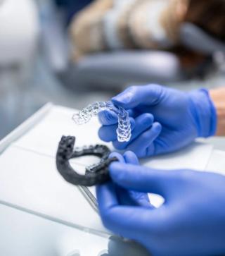 Invisalign vs. Veneers: Which is best to get a straighter smile?