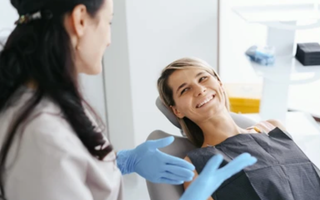 Patient with dentist discussing offers