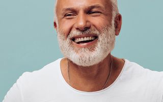 Image of a male with straight white teeth.