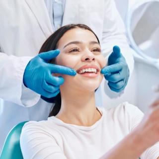 Image of a female patient undergoing a cosmetic assessment.