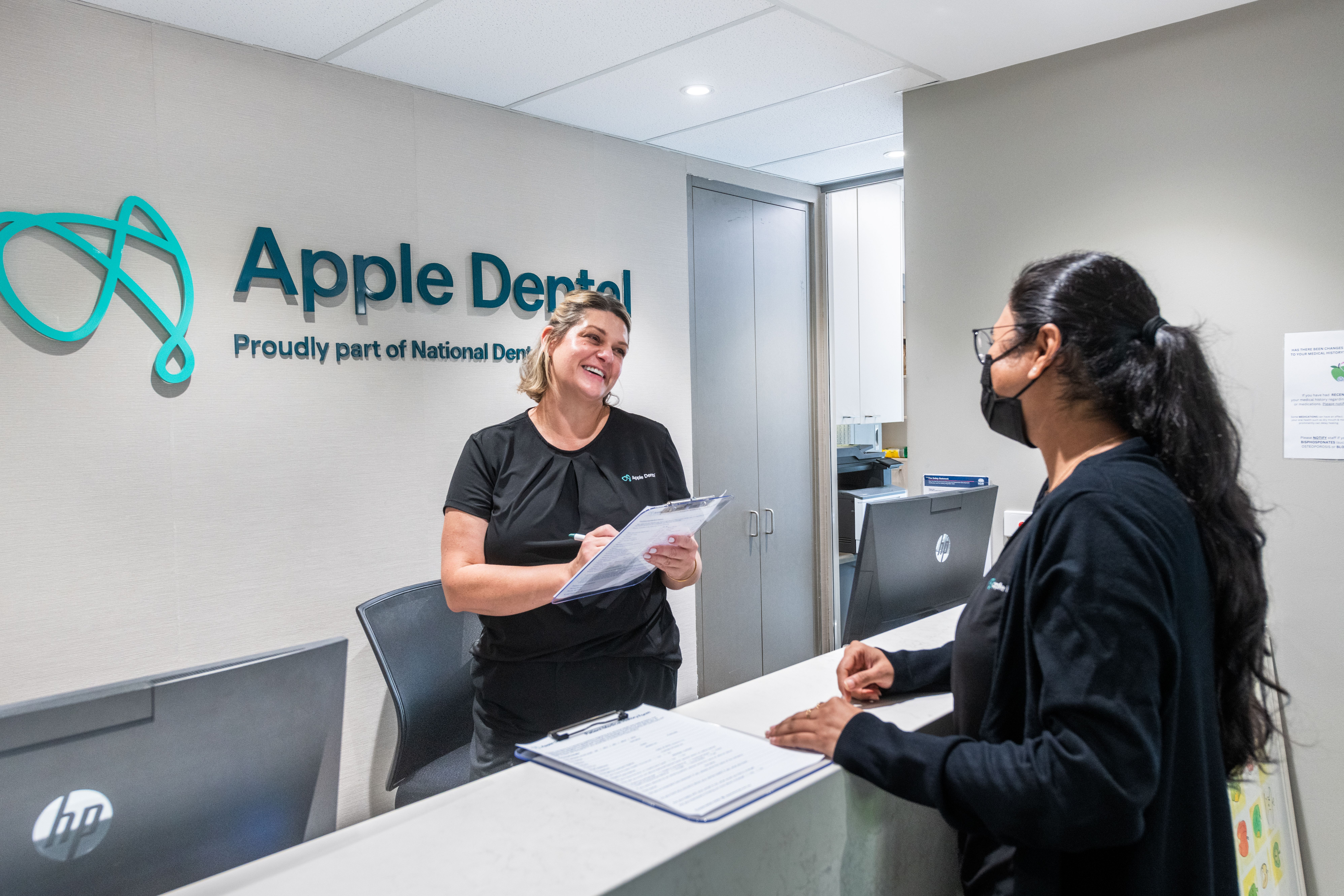 Apple Dental reception team