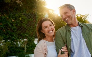 Happy smiling couple with perfect teeth