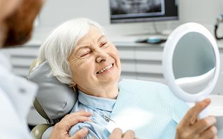 Dental Implants vs Dentures: What’s the Best Treatment For You?