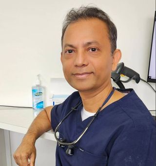 Dr. Raj Chakraborty - Dentist