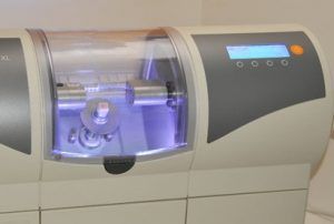 Image of a CEREC machine that creating teeth models.