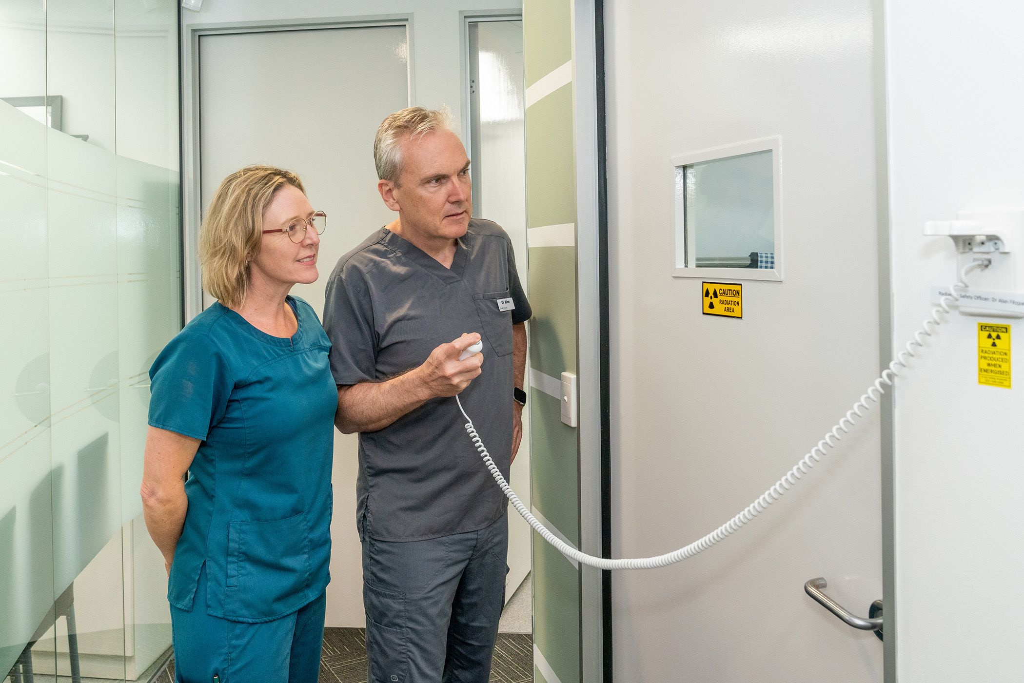 Our dentists and staff outside of a x-ray room.