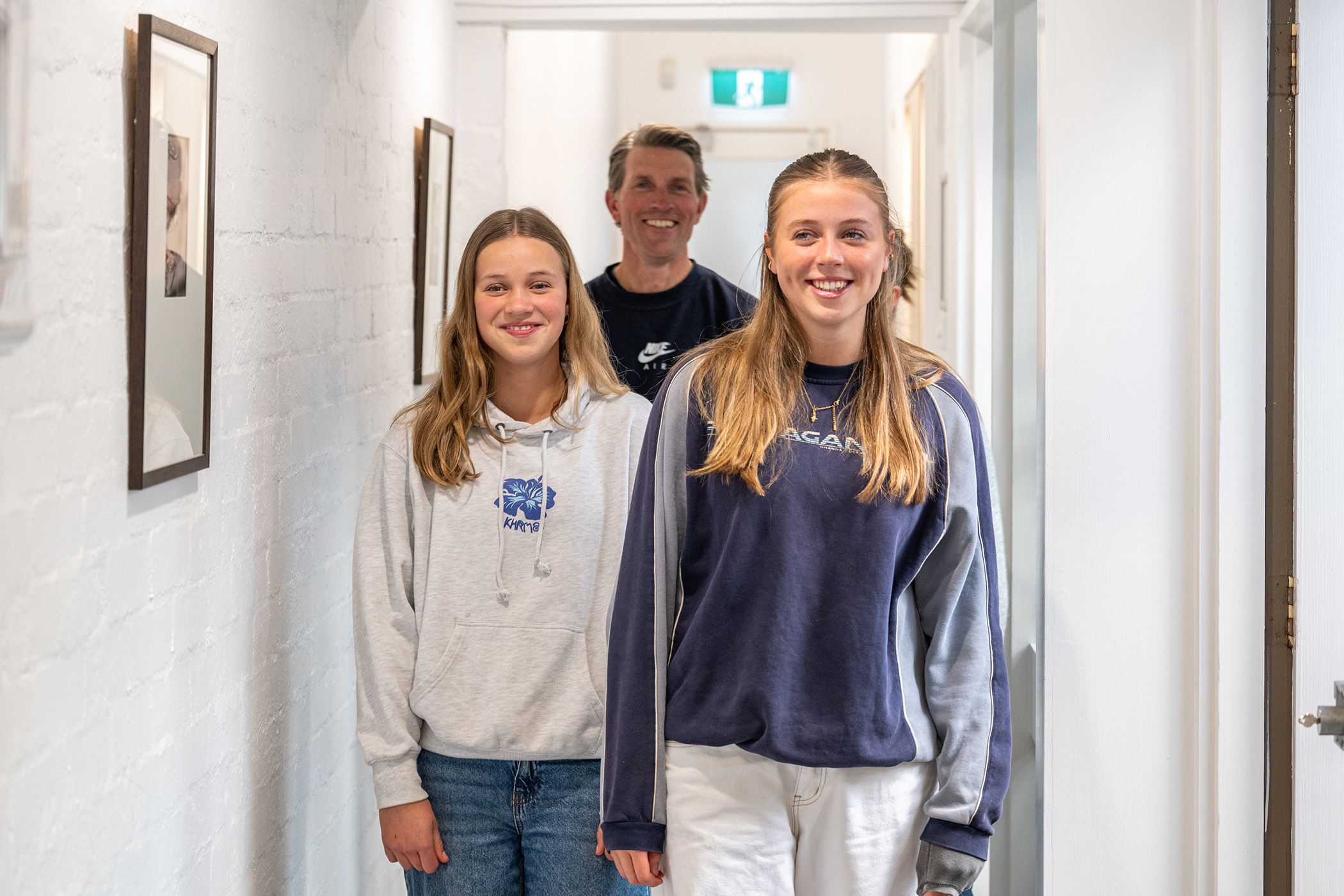 Young patients with their dad leaving the Martin Street dental clinic.