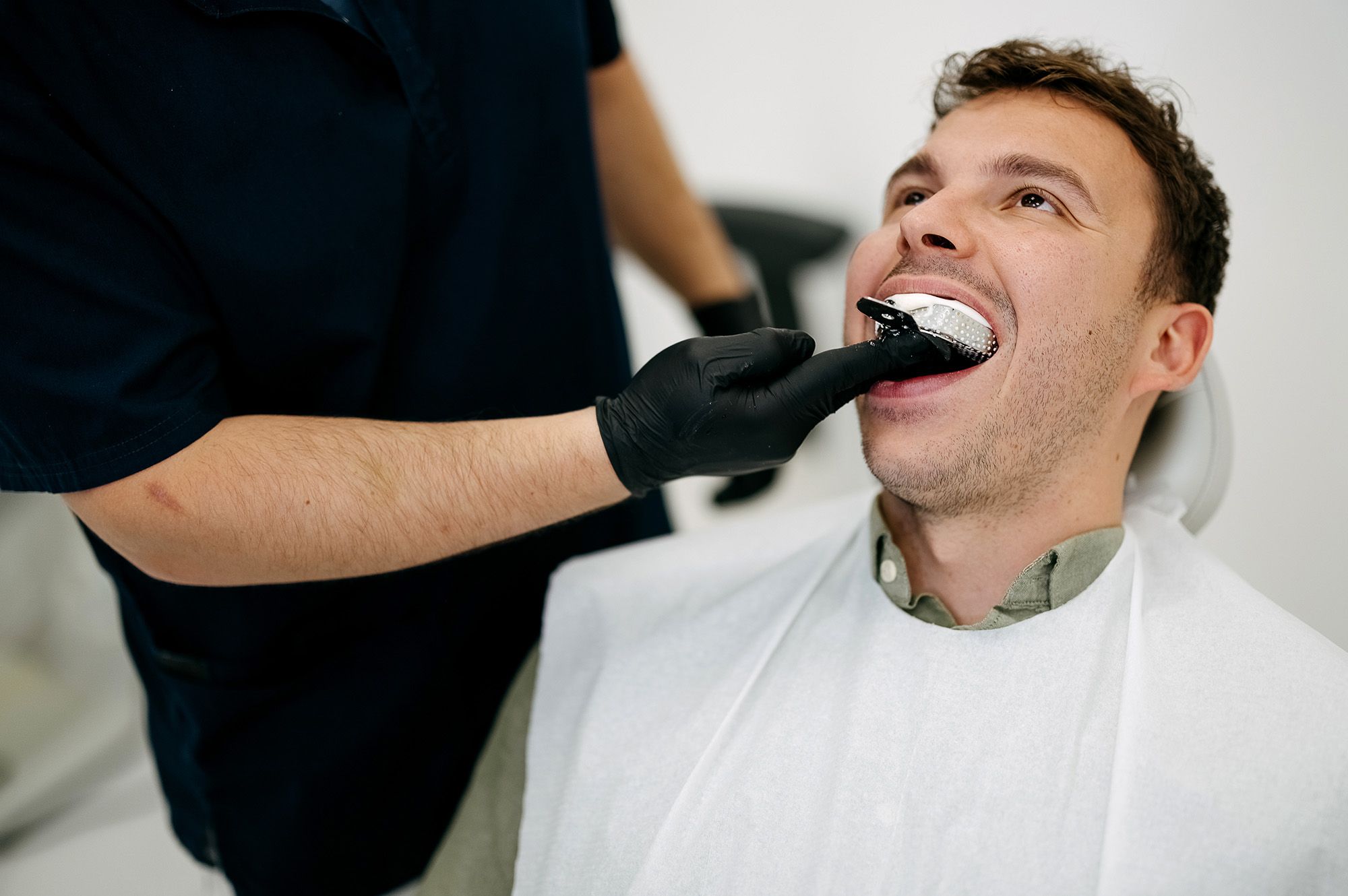 Assess your teeth and bite to ensure a mouthguard is right for you